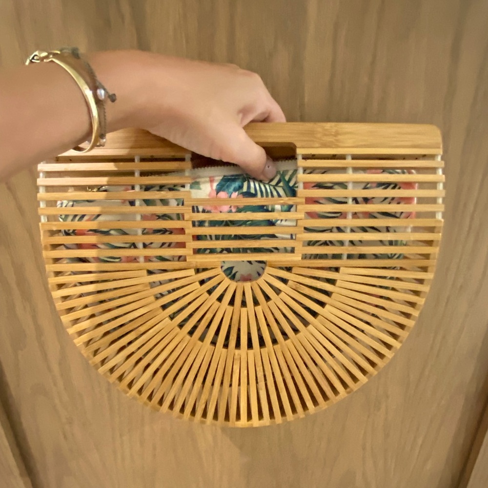 Vintage style bamboo clutch with removal insert liner.